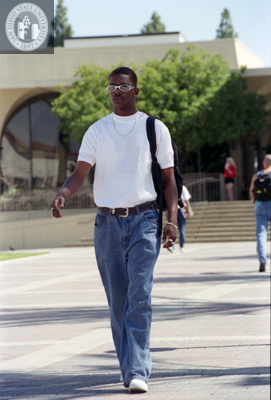 Portrait of a student in front of Aztec Center, 1996