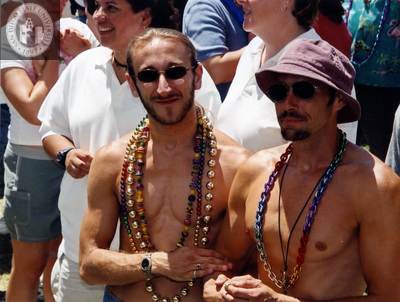 Shirtless men with necklaces at Commitment Ceremony, 2002