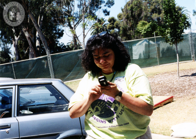 Cheli Mohamed volunteering at Pride festival, 1998