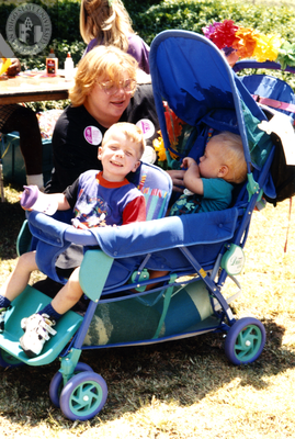 Person with children in stroller at For the Children, 1996