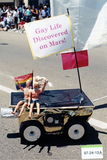 "Gay Life Discovered on Mars!" on toy vehicle at Pride parade, 1997