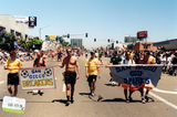 "San Diego Breakers" and "San Diego Soccer Sparks" banners at Pride parade, 1999