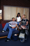 Students chat in a brick dormitory, 1995