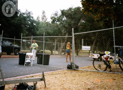 Gary and Kate Johnson in fenced area at Pride festival, 1998
