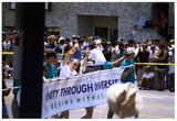 Sheila Clark and Judy Reif carry a banner in Pride parade, 1998