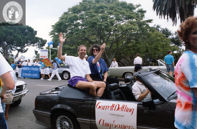 Garrett Dettling and Amy Somers ride on parade car, 1991