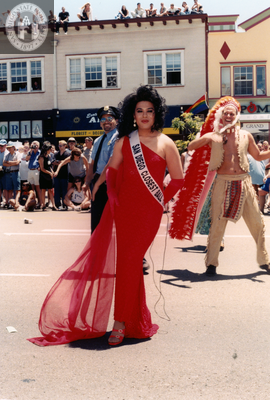 Marcher with "San Diego Closet Ball" sash in Pride parade, 1999