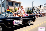 Men of the Year Jeff Palmer and Joe Pascale on parade car in Pride parade, 1997
