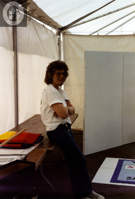 Kay Jordan in Lesbian and Gay Archives booth at Pride festival, 1990