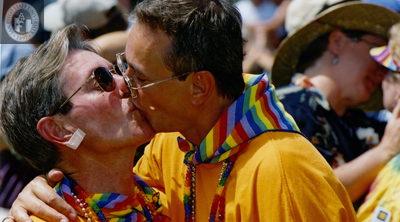 Couple kisses at Commitment Ceremony, 2001