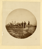 Uniformed men with cannon