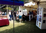Attendees at LGHSSD booth at Pride festival, 1993