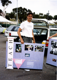Glen Drake holding LGASD display at Pride festival, 1991