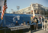 Attendees visiting booths at Pride festival, 1988