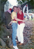Two people hugging at Pride parade, 1988