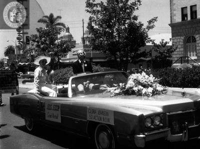 Jess Jessop and Gloria Johnson riding in car at Pride parade, 1977