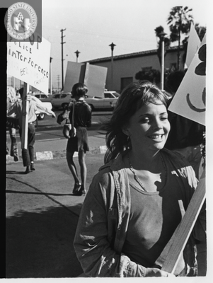 Woman picketing during Gay Liberation Front picket at SDPD, 1971