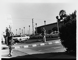 Person picketing during Gay Liberation picket at SDPD, 1971