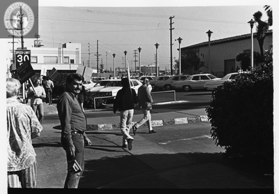 Picketers with man holding camera, Gay Liberation Front picket at SDPD, 1971