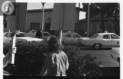 Picketer looks across street at SDPD, Gay Liberation Front picket, 1971