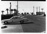 San Diego Police car drives past picketers from Gay Liberation Front, 1971
