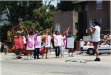 Marchers holding GLASS signs in Pride parade, 1998