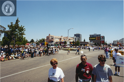 Marchers and vehicles join the Pride parade, 1996