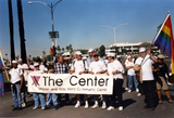 "The Center--Lesbian and Gay Men's Community Center" banner for Pride parade