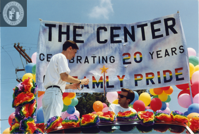 "The Center celebrating 20 years of family pride" banner at Pride parade