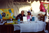 Sheila Clark and Judy Reif at their Shirtails booth at Pride festival, 1992