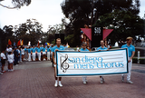 People hold San Diego Men's Chorus banner at Pride parade, 1995