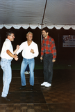 Merle Johnson and others dancing on the dance floor at Pride festival, 1995