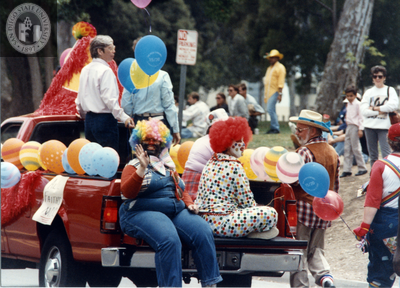 Clowns ride on truck in San Diego Pride Parade
