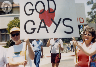 Marchers from Dignity Los Angeles with "God loves Gays" sign