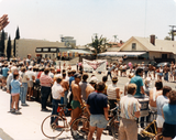 "FIGHT" banner in Pride Parade, with spectators, 1984
