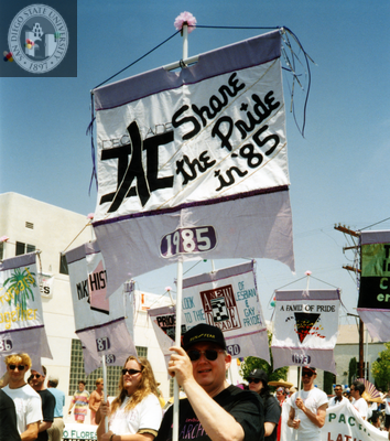 Banner with 1985 Pride theme "Share the Pride," 1993
