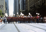 "Out of Many...One" banner in San Francisco Pride Parade, 1982