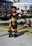 Feather-costumed person at San Francisco Pride Parade, 1982
