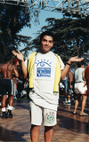 San Diego Pride: spectator wears a safety vest and "Share the Vision" t-shirt, 1997